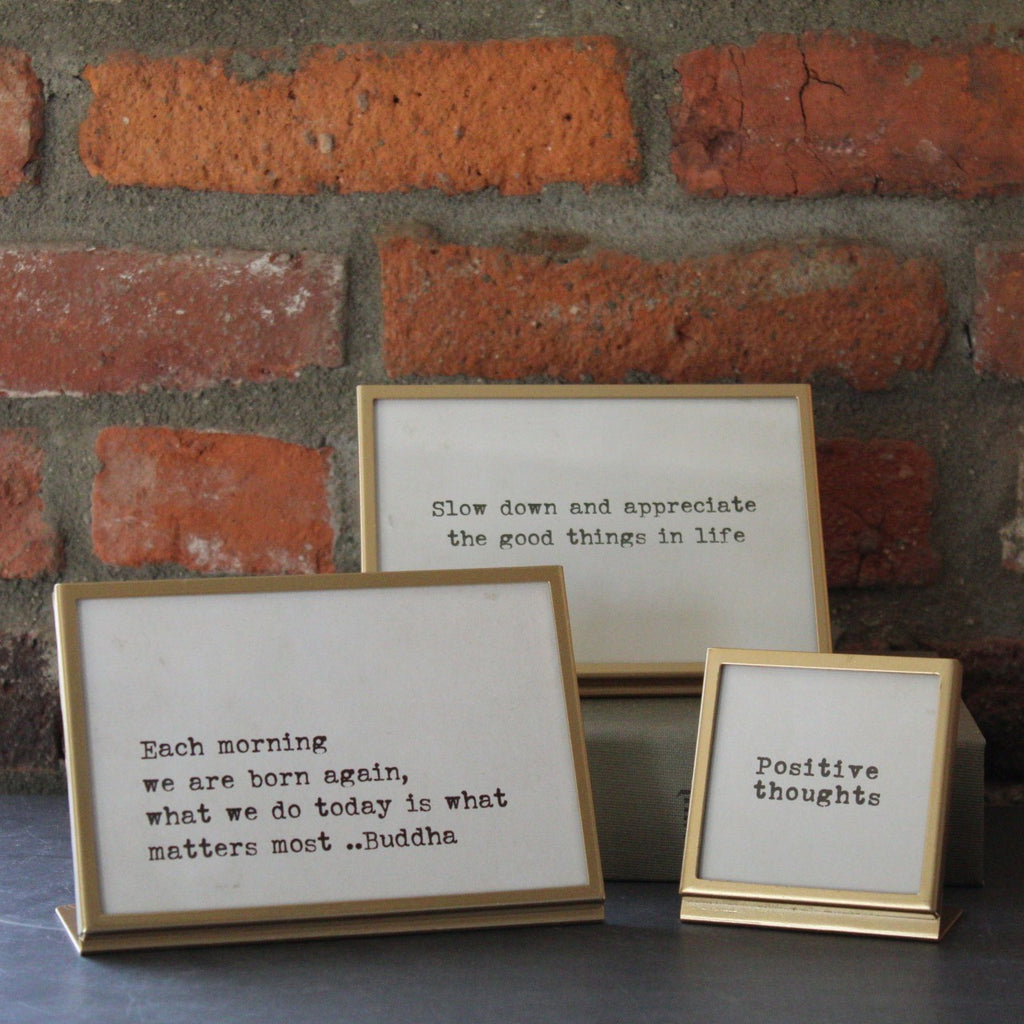 metal and glass easel frames featuring inspirational quotes 