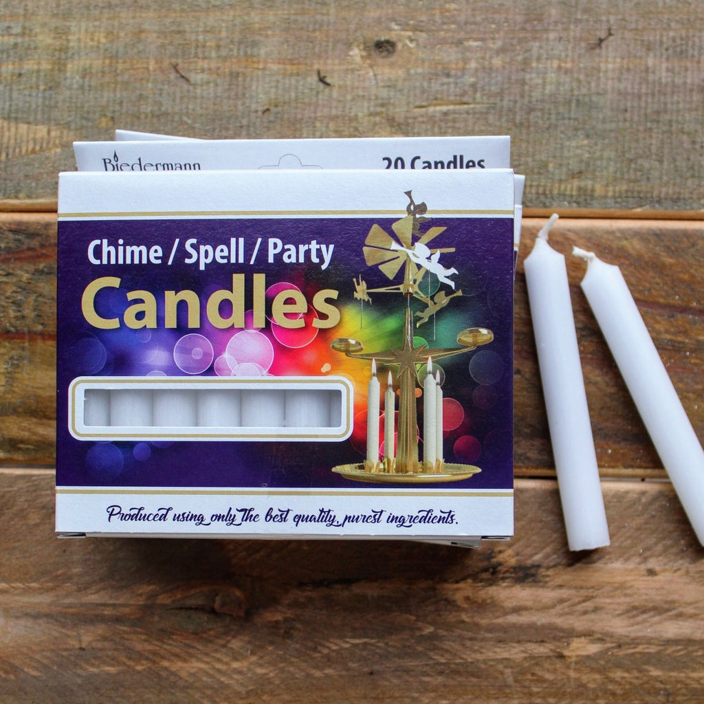 Box of 20 pristine white chime candles ready to bring purity and serenity to any setting
