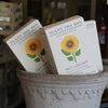 Three 'Plant the Box' Sunflower garden soap bars with sunflower design in a decorative pot.